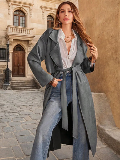 Model wearing Tie Waist Long Sleeve Coat in Dark Gray