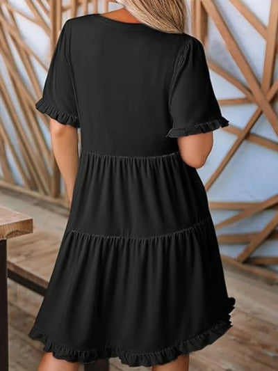 Back view highlighting the design of Tiered Notched Short Sleeve Mini Dress in Black
