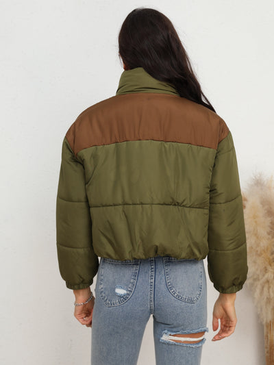 Side view of Two-Tone Zip-Up Puffer Jacket, highlighting the warm puffer fabric and stylish two-tone details.