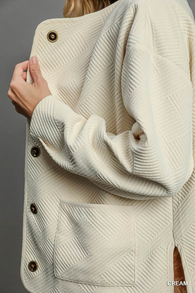 Model wearing Umgee Textured Jacquard Jacket, demonstrating the stylish fit and detailed jacquard design for a chic look.