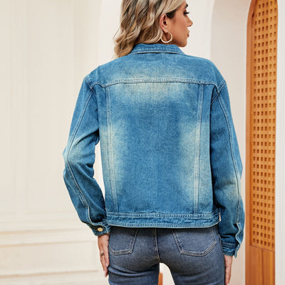 Side view of Washed Denim Jacket, showcasing the relaxed fit and timeless denim look.